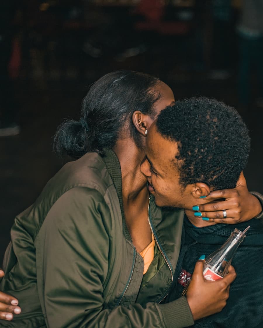 A couple sharing a close, joyful embrace